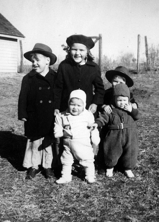 1942 ? Back - Charles, Doris, A. B. Front - Jerry in white and Gordon Gray