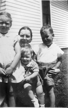 1942 ? Doris, Catherine Moyer, sister of Julia Fisher, Charles on right, A. B. Fisher in front